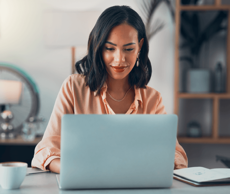 A woman working on her laptop