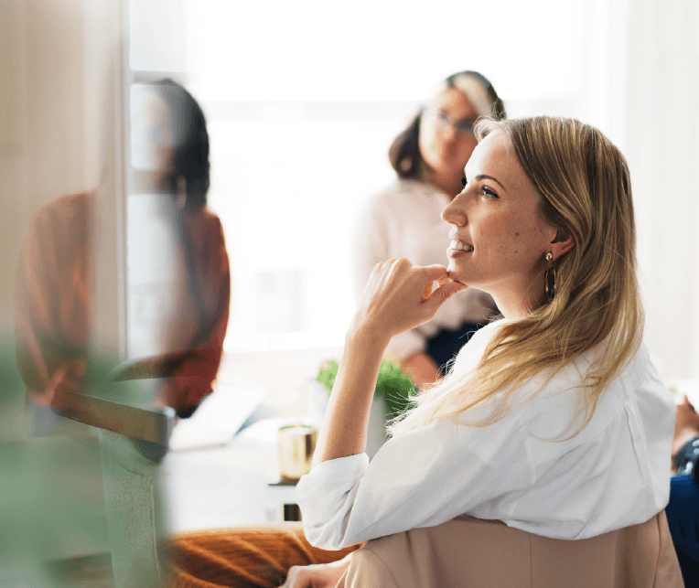 Women listening to a presenter