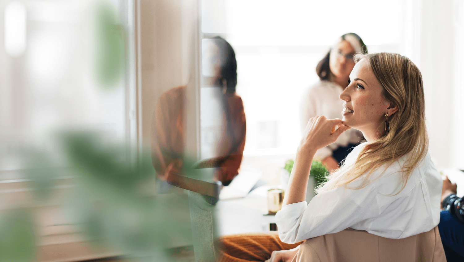 Women listening to a presenter