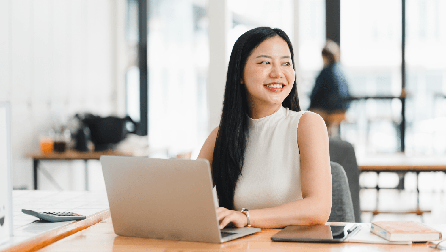 A woman working on her laptop