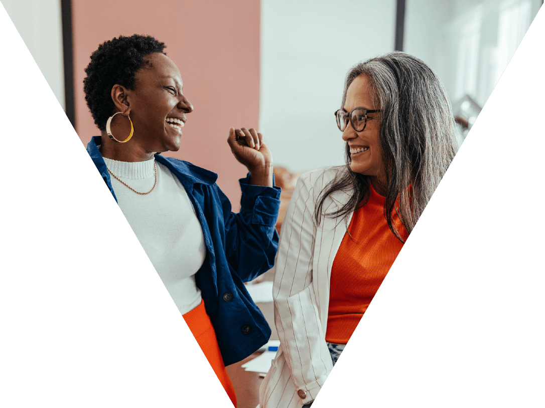 Two women working together