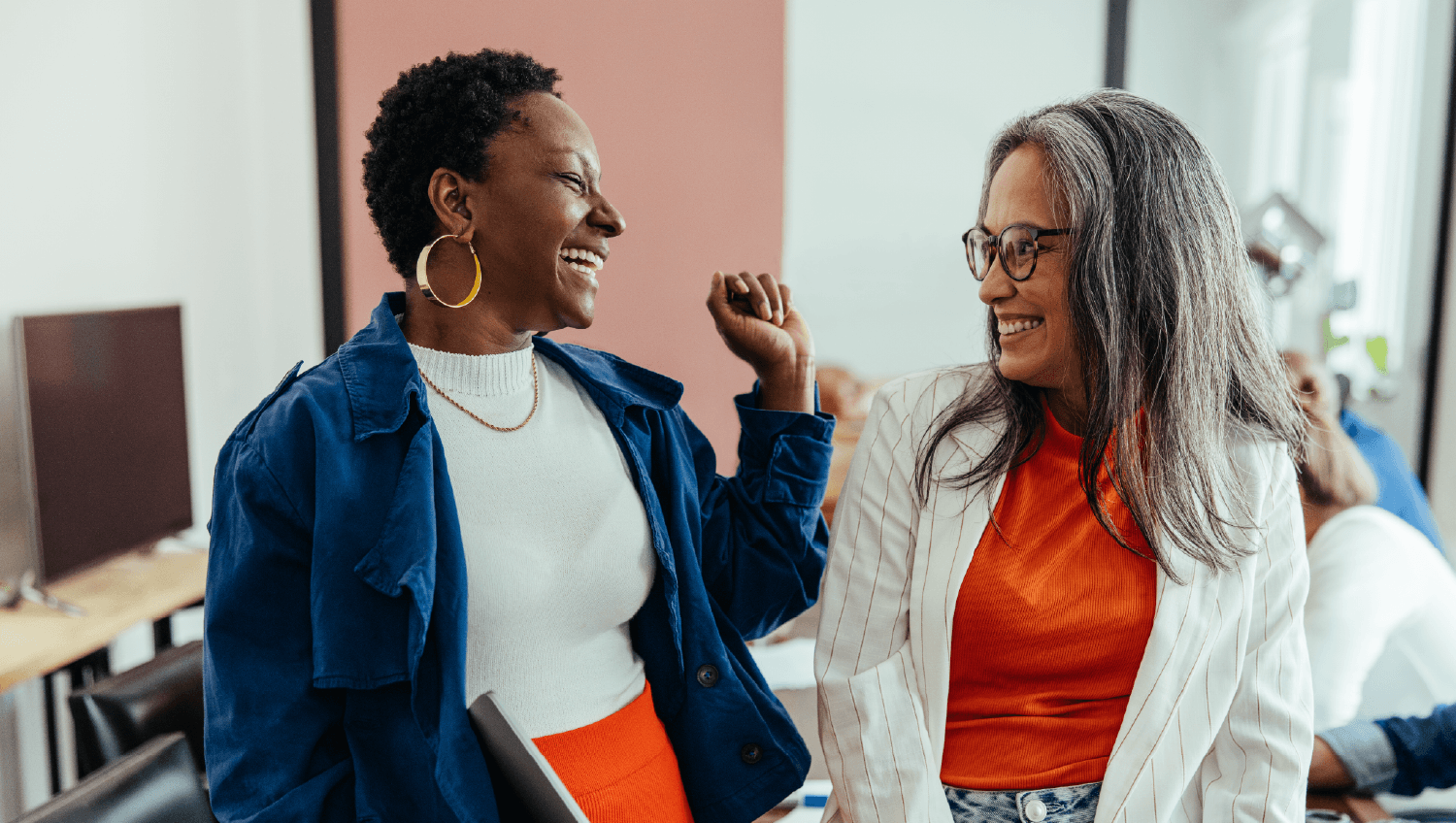 Two women working together