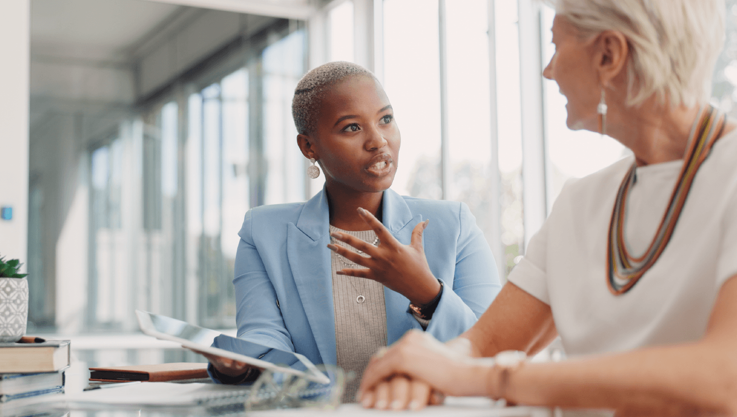 Two coworkers discussing subrogation